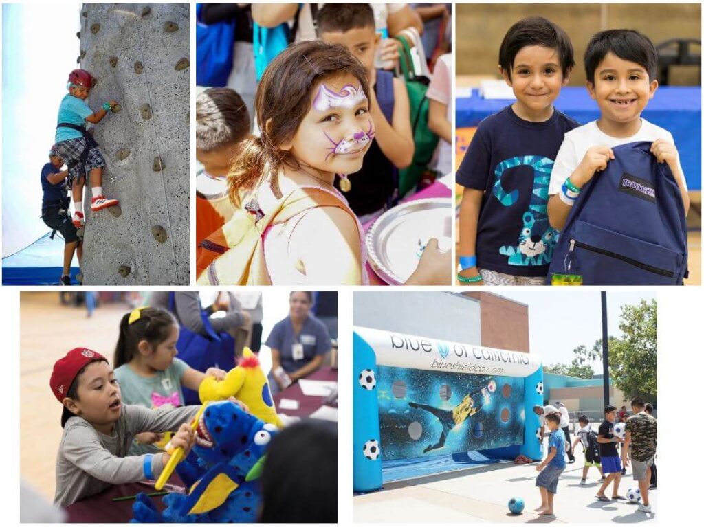 A collage of five photos from a Back to School community health and wellness event. Top left: A young child wearing a helmet climbs a rock climbing wall while being assisted by a spotter below. Top center: A smiling girl with a cat face paint design holds a paper plate at the event. Top right: Two young boys smile together while one holds up a navy blue backpack received at the event. Bottom left: A child wearing a red cap plays with colorful stuffed animal toys at an activity table with event staff visible in the background. Bottom right: Children kick soccer balls toward a Blue Shield of California (blueshieldca.com) branded inflatable goal structure set up outdoors.