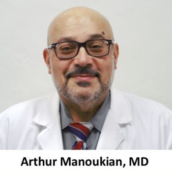 Arthur manouk, md, phd, is posing for a photo.