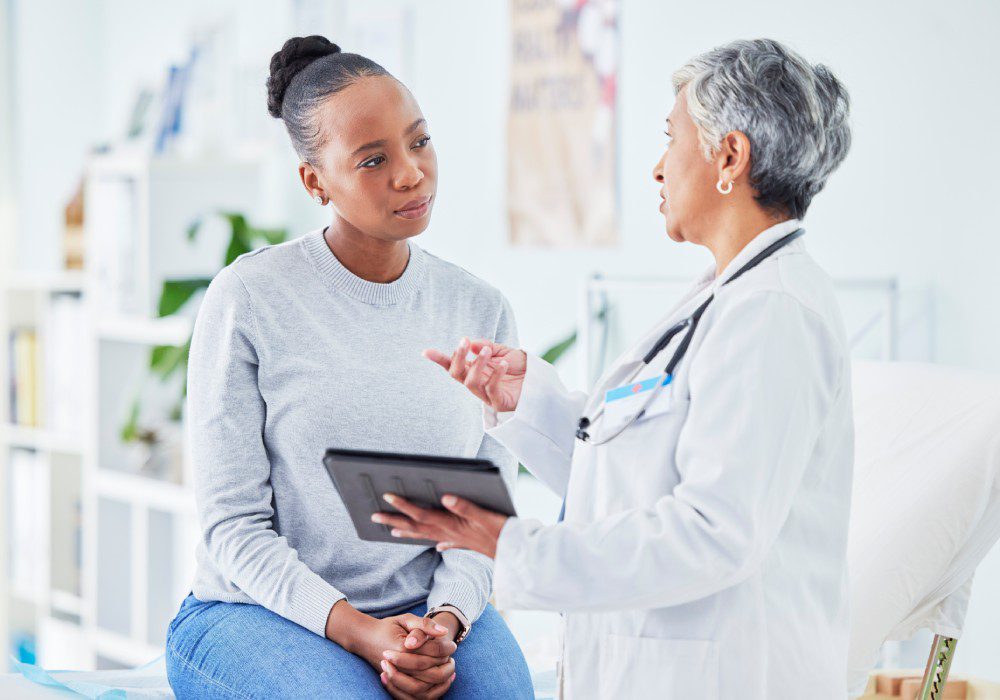 Doctor, woman and tablet for hospital, healthcare advice and support for results.