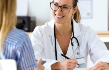 Portrait of female doctor explaining diagnosis to her patient.