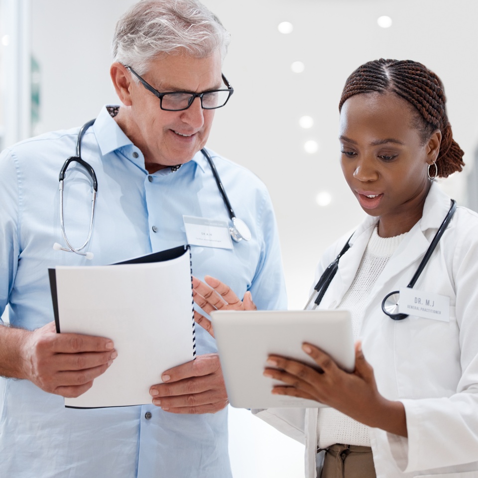 Shot of two doctors discussing a patients results.