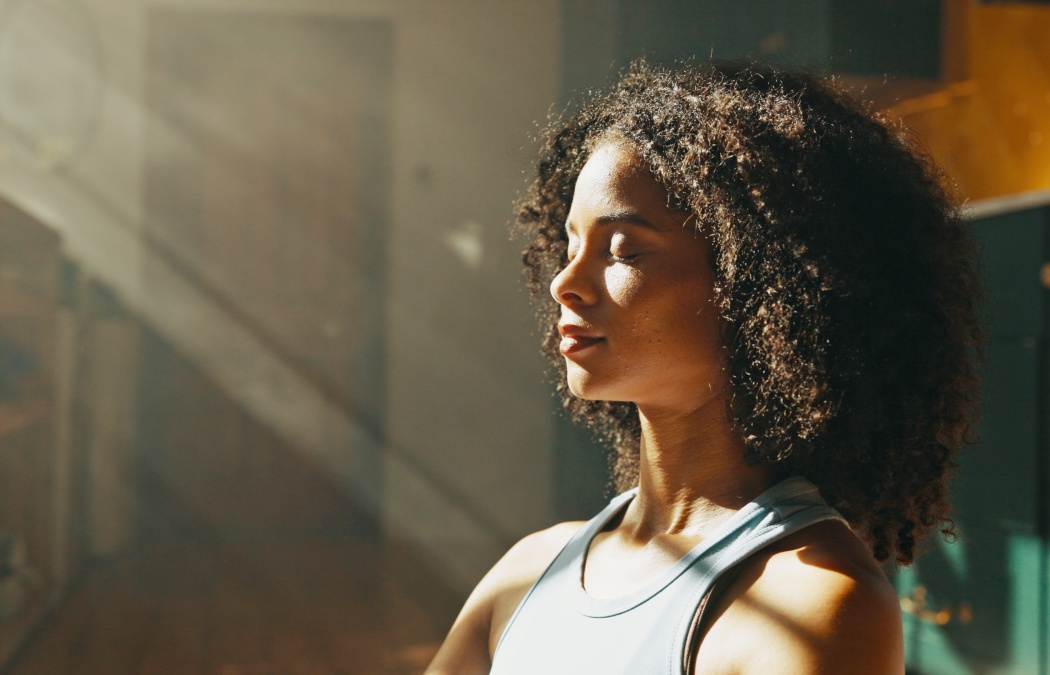 Calm woman, relax and sunlight with meditation at home for zen, awareness or mindfulness. Female person, yogi or balance with inner peace for stress relief, breathing exercise or wellness at house.