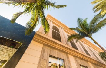 Palm trees and luxury buildings in Rodeo Drive, Beverly Hills. Los Angeles county, California