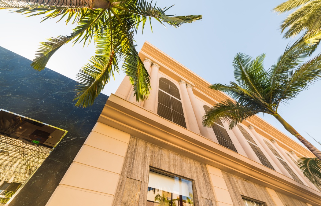 Palm trees and luxury buildings in Rodeo Drive, Beverly Hills. Los Angeles county, California